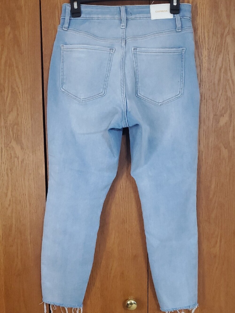 Express Light Blue Ripped Ankle Jeans - Picture 2 of 3